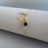 Bracelet solitaire fumé aile et pompon vert