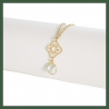 Collier arabesque 4 coeurs et cristal serti clos