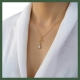 Collier arabesque 4 coeurs et cristal serti clos